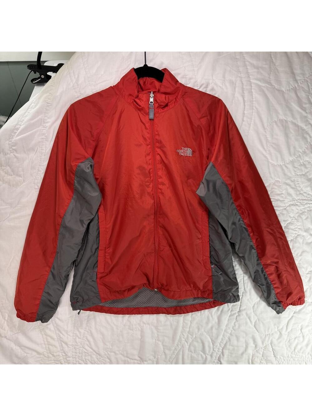 The North Face red windbreaker jacket Size M